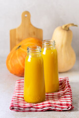 Bottle of tasty Pumpkin Smoothie or Drink on Napkin Healthy Detox Drink Vertical