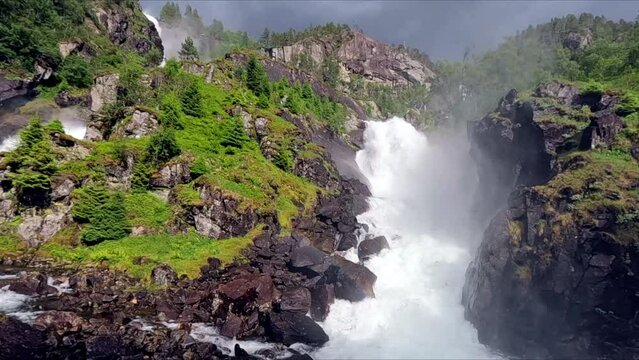 Spectacular, famous Waterfall, Latefossen, Norway, dolly shot