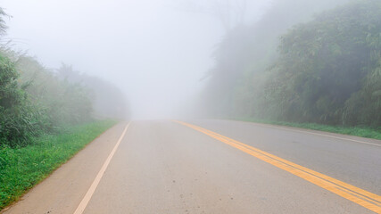 fog on Country Road with Mountain