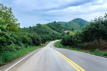 Country Road with Mountain and blue sky