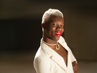 Happy black gay looking at camera
