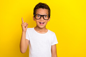 Photo of cute boy raise arm hand wear stylish outfit spectacles find solution problem answer...