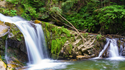 Kamyanka waterfall in the forest