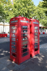 Fototapeta na wymiar The famous red telephone boxbooths in London