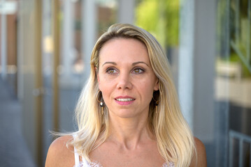 Attractive mature blond woman with a quiet smile