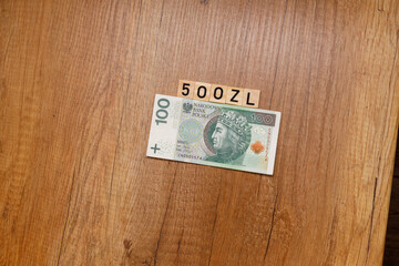 Polish money. Polish banknotes placed on a heap which is  a backdrop to many various financial...