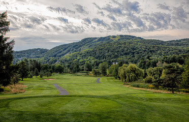 Fototapeta na wymiar Golf Chateau Bromont on a beautiful summer day at the foot of Mont Bromont 