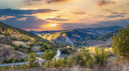 Panoramic rural landscape at sunset. Basilicata region, Italy