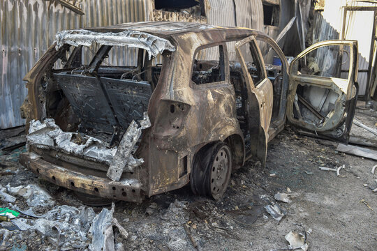 
"Busha, Kiev region Ukraine - 08.13.2022 :A selection of cars and motorbikes shot or burnt during the war in the Kiev region."