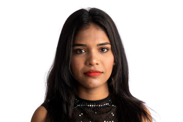 Portrait of a young girl wearing black dress posing on a white background