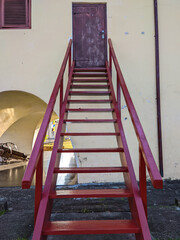 Red stairs to the house