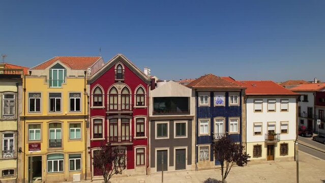 Aerial drone view of Traditional colorful Portuguese houses in Almada Square, Povoa de Varzim, Portugal. 