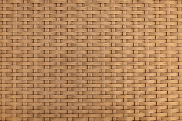 Texture of intertwined brown plastic rods.