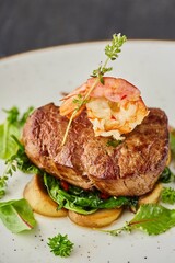 Pork, lamb or beef meatloaf with mushrooms, nuts, tomatoes and herbs. A dish from the chef for serving in a restaurant.