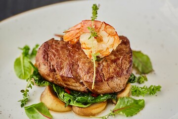 Pork, lamb or beef meatloaf with mushrooms, nuts, tomatoes and herbs. A dish from the chef for serving in a restaurant.