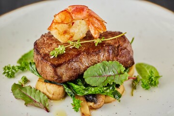 Pork, lamb or beef meatloaf with mushrooms, nuts, tomatoes and herbs. A dish from the chef for serving in a restaurant.