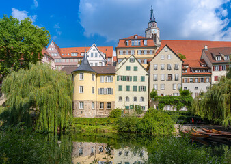Fototapeta na wymiar The Hölderlin Tower on the historic old town bank of the Neckar River in Tübingen