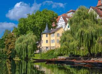 The Hölderlin Tower on the historic old town bank of the Neckar River in Tübingen....