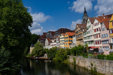 Fototapeta na wymiar The Hölderlin Tower on the historic old town bank of the Neckar River in Tübingen