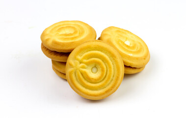 Cream sandwich cookies isolated on white background.