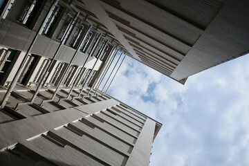 Naklejka premium low angle view of signapore residential buildings against blue sky 
