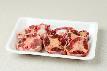 Raw Oxtail on Styrofoam Plate