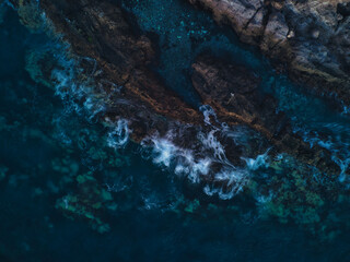 Waves crashing against Tenerife's volcanic coastline