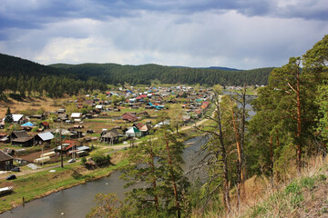 Peasant Tatar village on the banks of the river