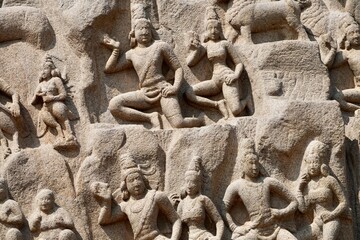 Descent of the Ganges: A giant open-air rock bas relief carved on two monolithic rocks in Mahabalipuram. It contains sculptures of animals, God, people and half-humans carved in the rock relief.