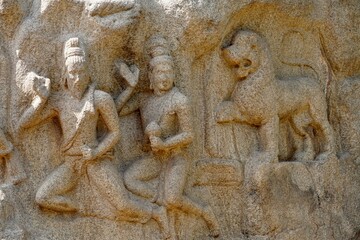 Descent of the Ganges: A giant open-air rock bas relief carved on two monolithic rocks in Mahabalipuram. It contains sculptures of animals, God, people and half-humans carved in the rock relief.
