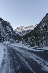 Fototapeta na wymiar Mountain road in winter, Tanaro valley, Piedmont, Ligurian Alps, Italy