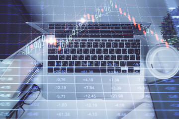 Multi exposure of financial chart drawing over table background with computer. Concept of research. Top view.
