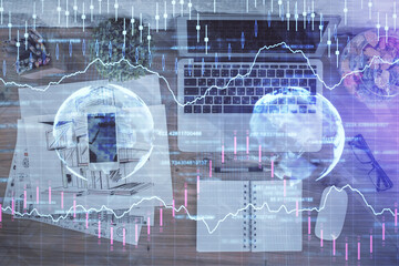 Multi exposure of financial chart drawing over table background with computer. Concept of research. Top view.