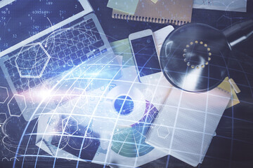 Double exposure of map hologram drawing over study table background with computer. Concept of international network. Top view.