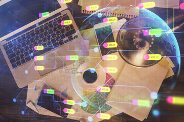 Multi exposure of data theme drawing hologram over topview work desk background with computer. Concept of technology.