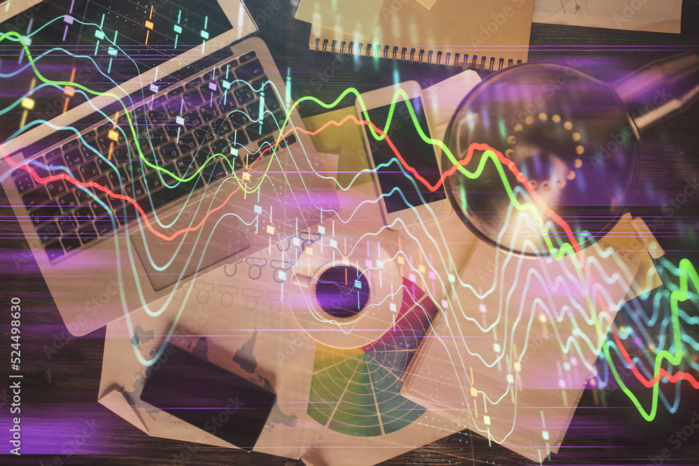 Poster financial market graph and top view computer on the desktop background. multi exposure. investment c