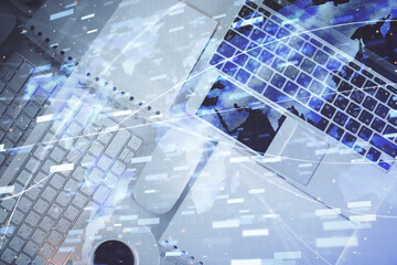Multi exposure of data theme drawing hologram over topview work desk background with computer. Concept of technology.
