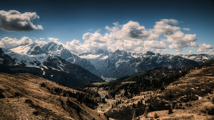 Passo Gardena, (Bz) in June 2022, you can see the morning light on the morning clouds, with the...