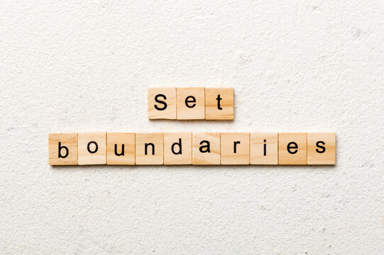 set boundaries word written on wood block. set boundaries text on table, concept