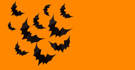 Halloween photo of black bats, ghost on blank orange background. Halloween decoration