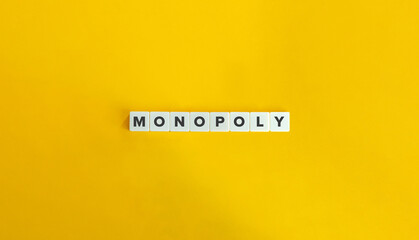 Monopoly (Absence of Competition) Banner. Block Letter Tiles on Yellow Background. Minimal Aesthetics.