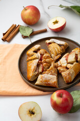 Sliced autumn apple pie crust galette on plate