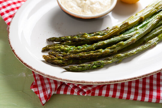 Close Up Of Grilled Spring Asparagus Vegetables On Plate Food Textile