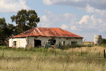 Fototapeta premium Photo of abandoned old houses and buildings in South Africa, red stone, mud and stone walls