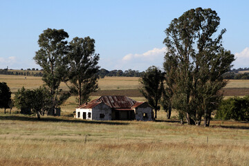 Photo of abandoned old houses and buildings in South Africa, red stone, mud and stone walls