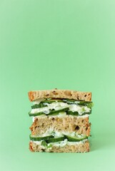 Sandwich with cream cheese and sliced cucumbers