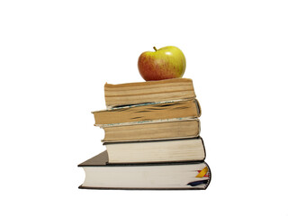 apple on a stack of books isolated on the white background,old and new books,concept of love of reading