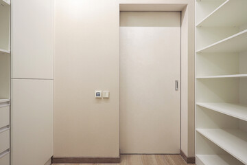 White door inside dressing room in the interior