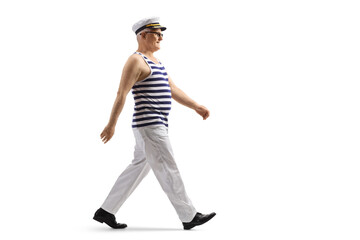 Full length profile shot of a sailor walking