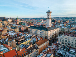 Naklejka premium aerial view of lviv city hall on sunset